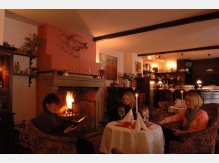 Sitting by Fireplace