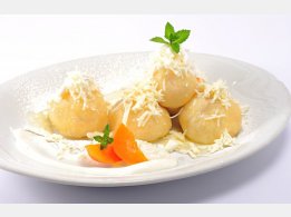 Apricot Dumplings with Cottage cheese, Melted Butter and Sugar